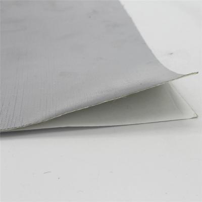 Heat shield barrier with adhesive